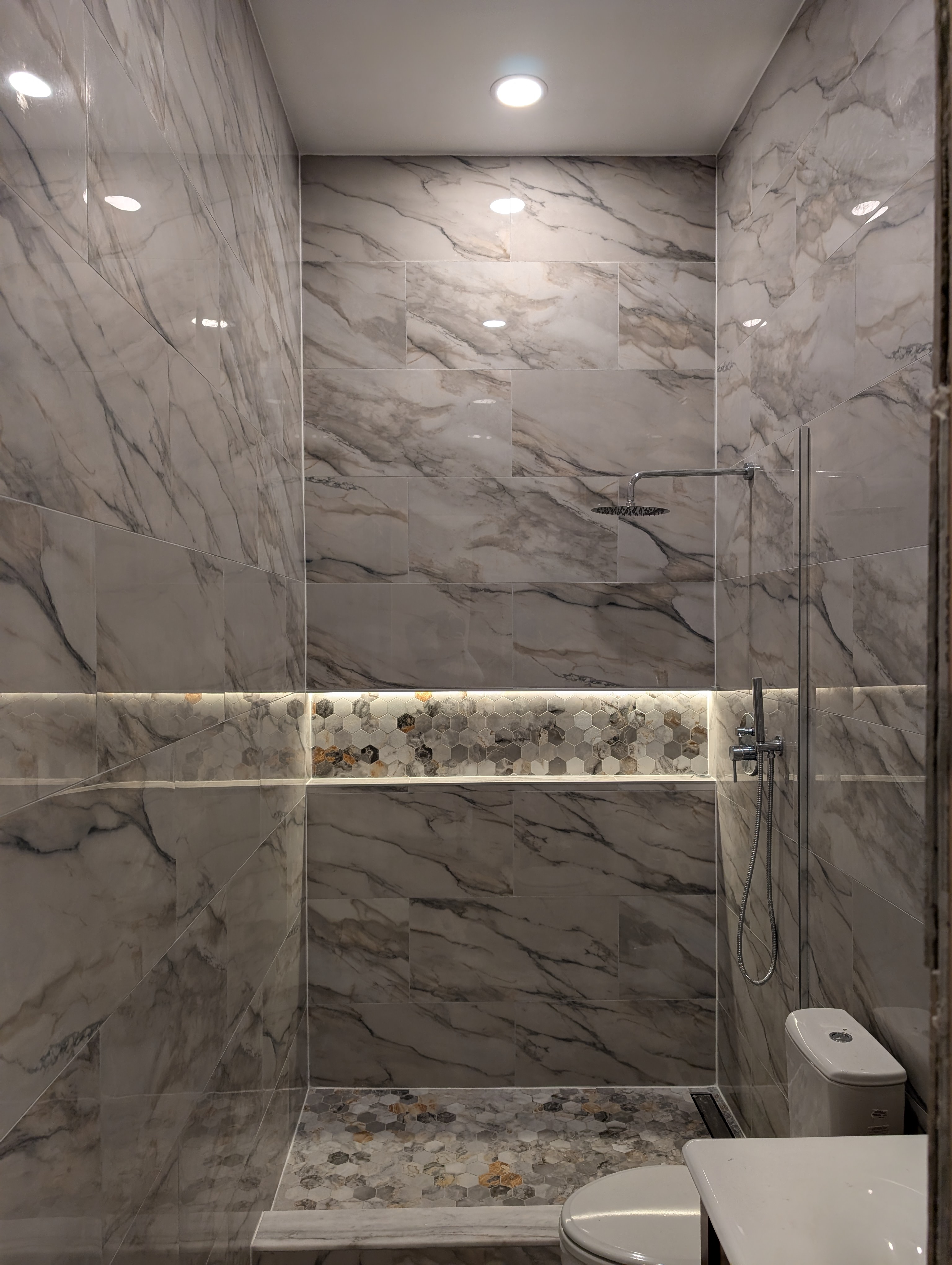 Finished bathroom remodel by Mad Home Improvements