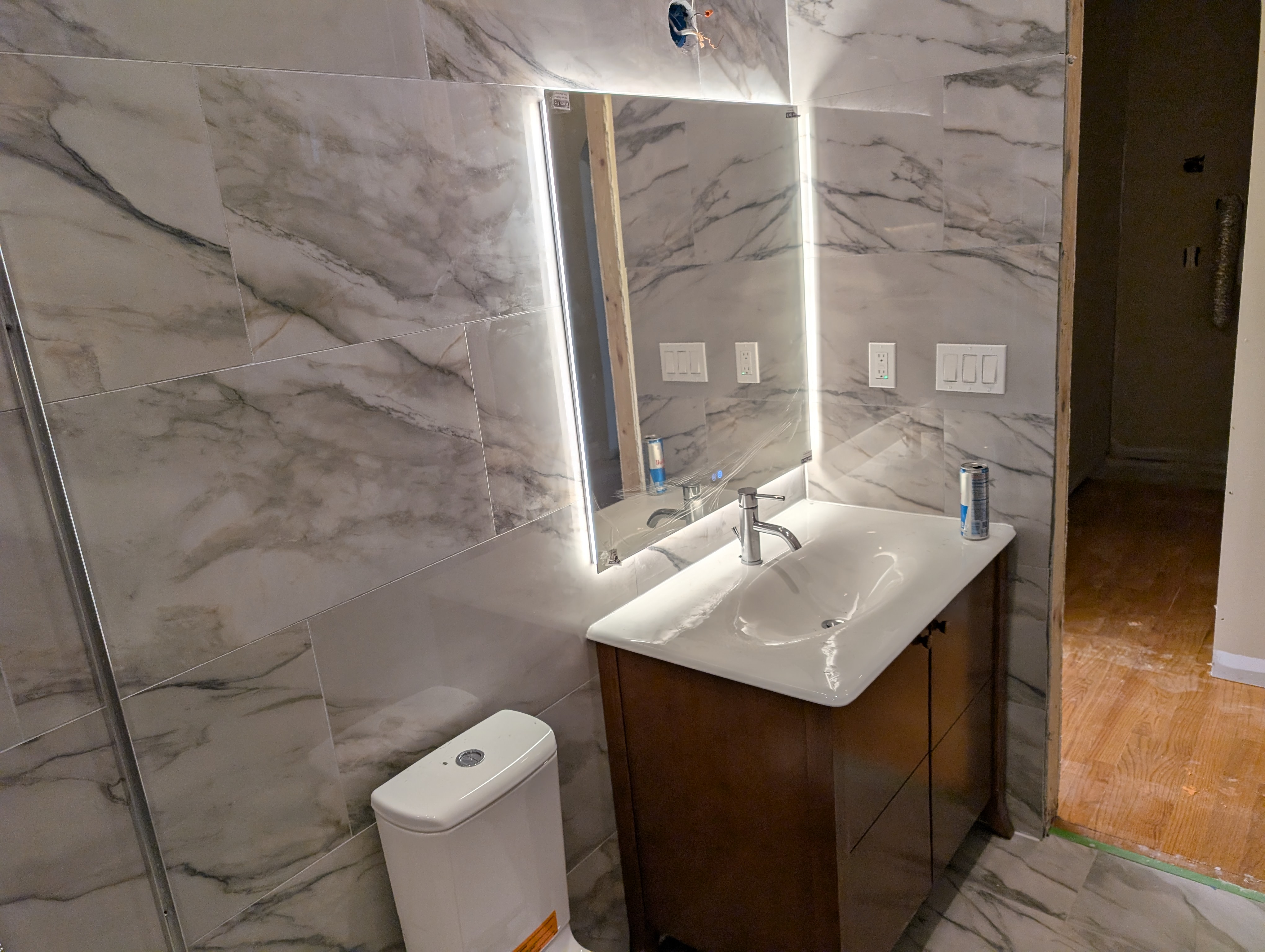 Finished bathroom remodel by Mad Home Improvements