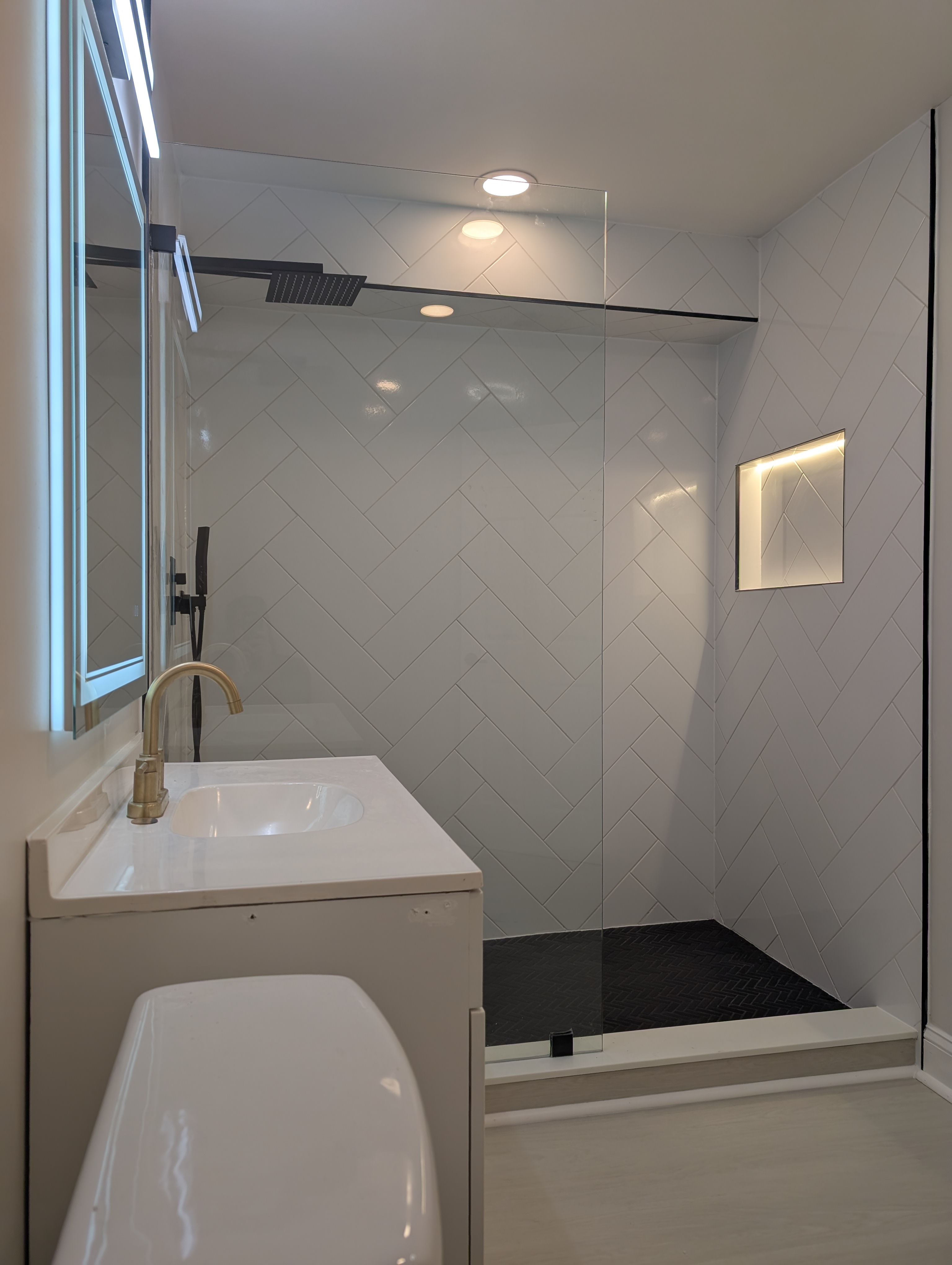 Finished bathroom remodel by Mad Home Improvements